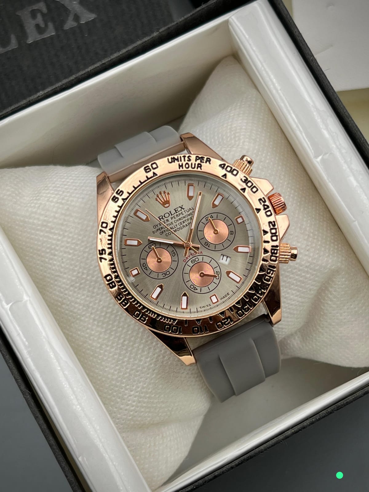 ROLEX DAYTONA Gent's Collection. Crafted with a sturdy rubber strap and brass case